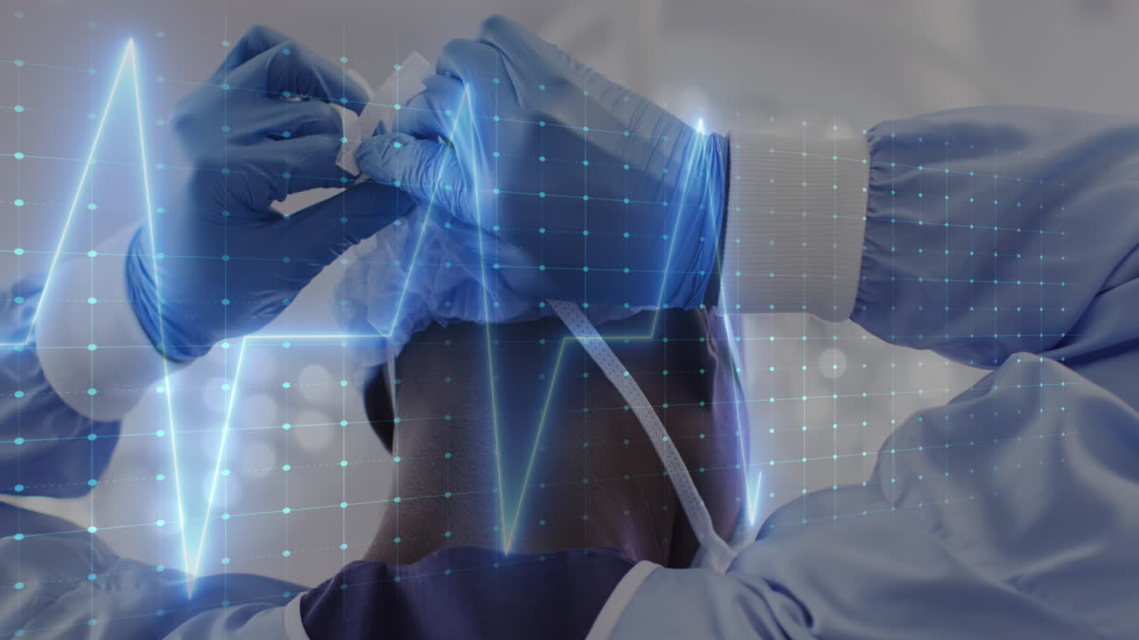 병원에서 얼굴 마스크를 착용한 아프리카계 미국인 남성 외과 의사에 대한 심장 촬영 애니메이션