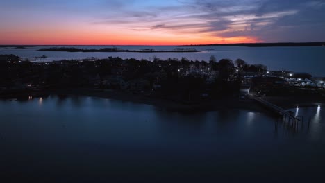 An-aerial-time-lapse-over-the-Long-Island-Sound-by-the-Bronx,-New-York
