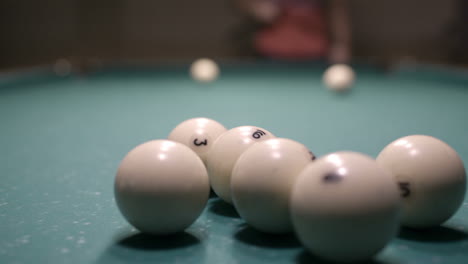 man playing billiards