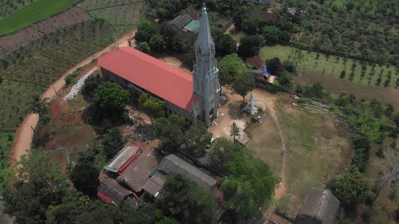 Orbit around of Catholic Church at Tuy&ecirc;n Quang Vietnam, aerial