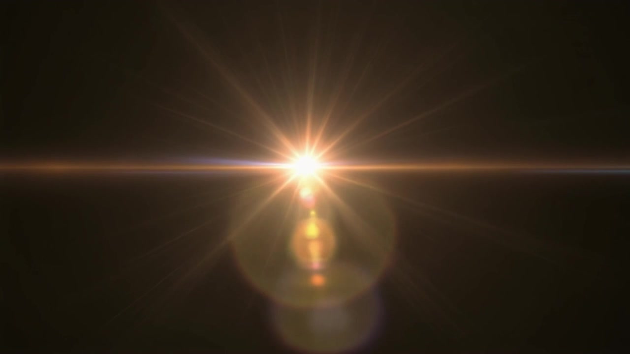 Effetto Golden Lens Flare su sfondo nero