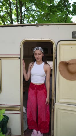 teenage girl in a campervan