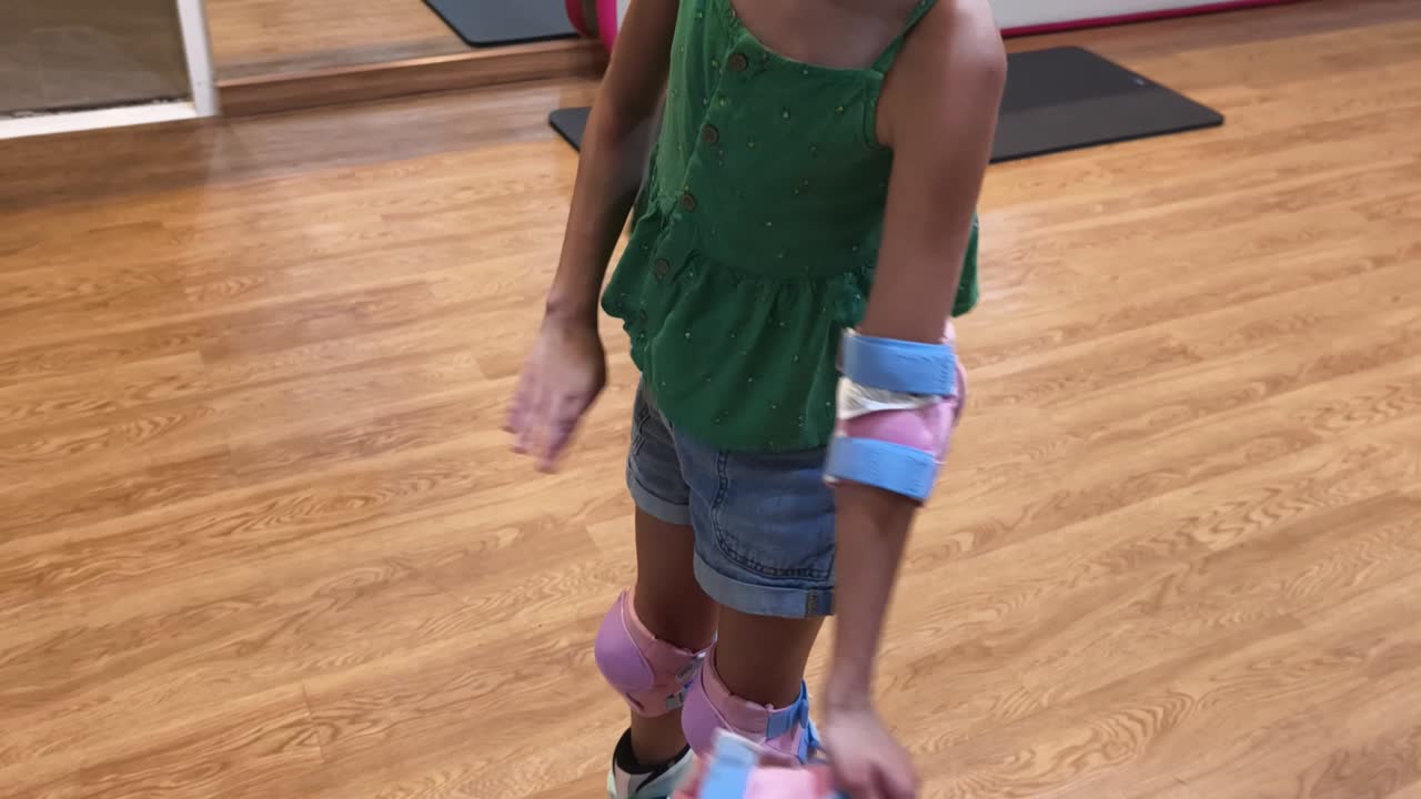 Child Getting Ready to Roller Skate