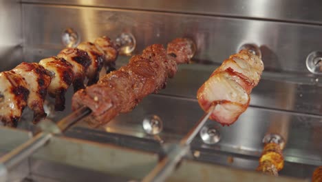 frying meat through on a big restaurant grill.