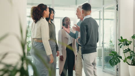 happy diverse team celebrating success in modern office