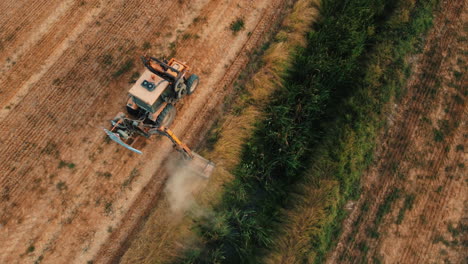 aerial view of a tractor mowing along a field border