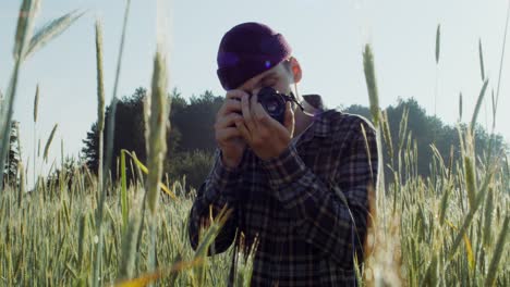 photographer in a wheat field