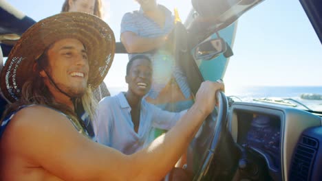 group of friends having fun in the car 4k