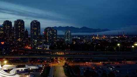 drone shot of skyline of vancouver canada - goldy