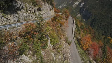 mountain panoramic road in haute-savoie during autumnal foliage, france