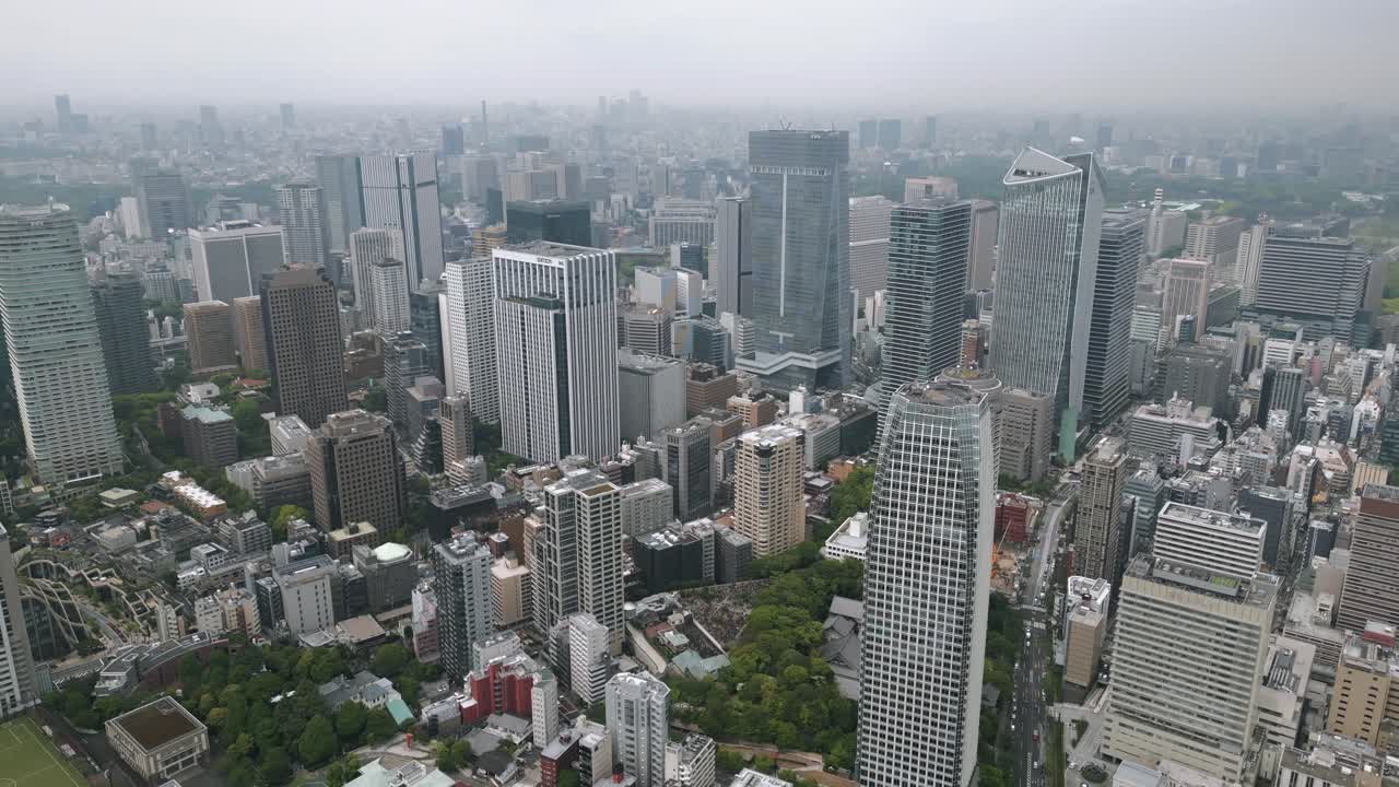 Aerial Scenic Urban Drone Footage of Buildings and Skyscrapers in Downtown Tokyo in the Capital City of Tokyo, Japan