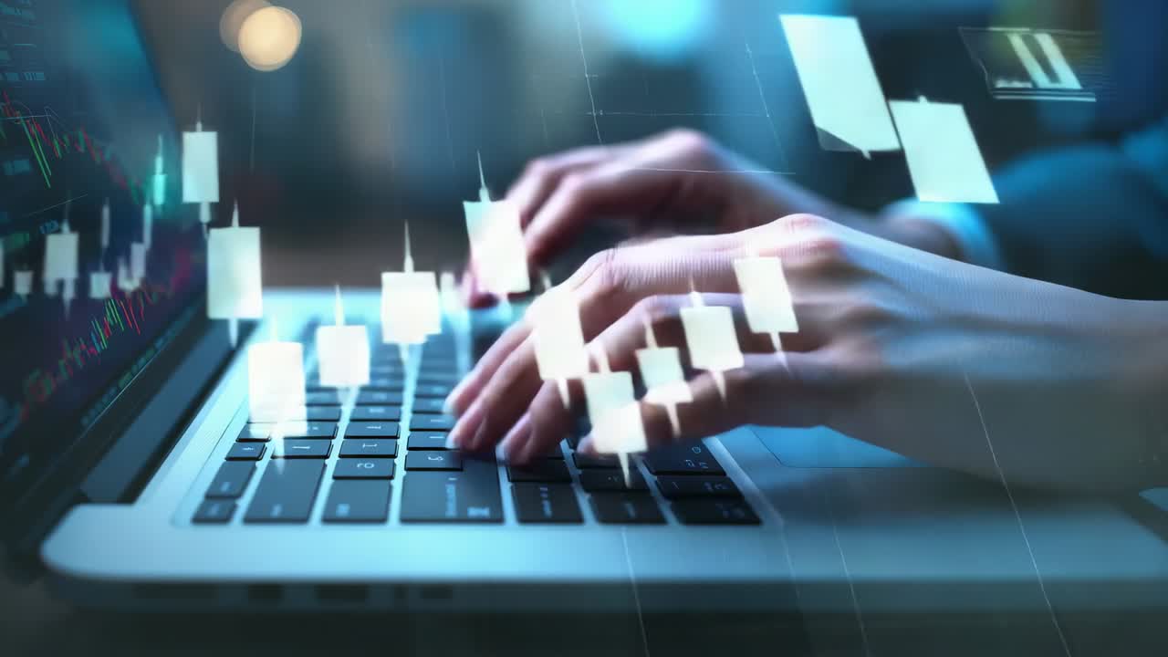 Typing hands in suit cuff live trading on laptop at desk, with candlestick overlays