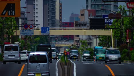 a timelapse of the traffic jam at the urban street in tokyo long shot