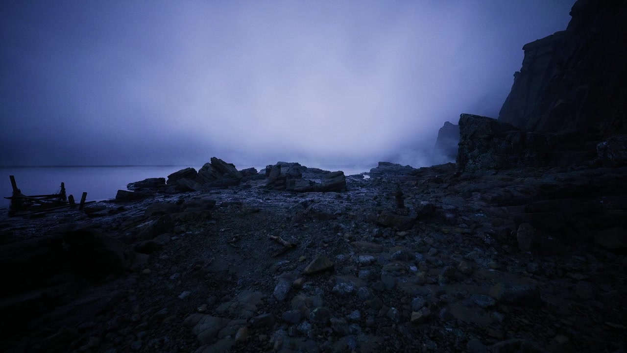 Frozen shoreline with silhouettes under moody violet sky and fog
