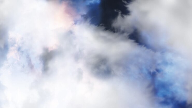flying through white clouds in the sky against a backdrop of thunderstorms