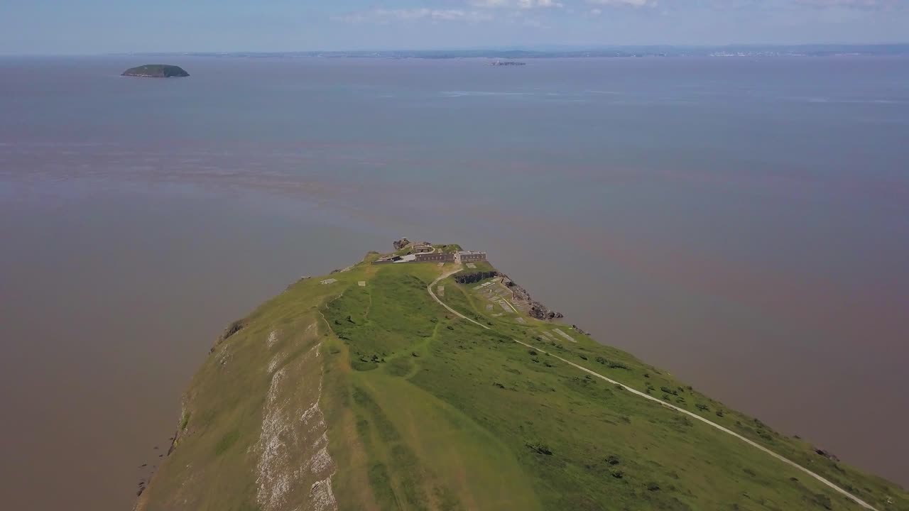 Aerial view of Brean Down hill and beach in Burnham on sea Somerset England.