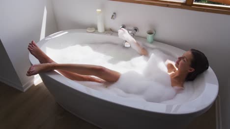 woman relaxing in a bathtub