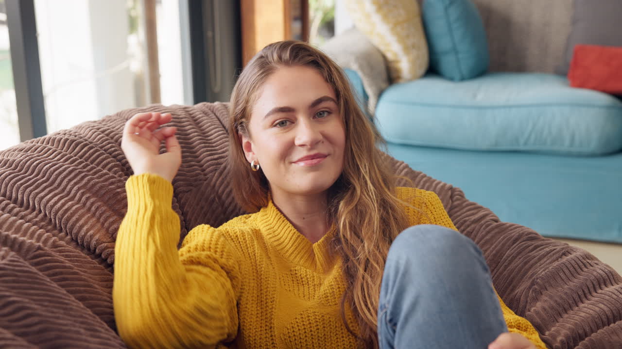 Woman relaxing on a beanbag chair