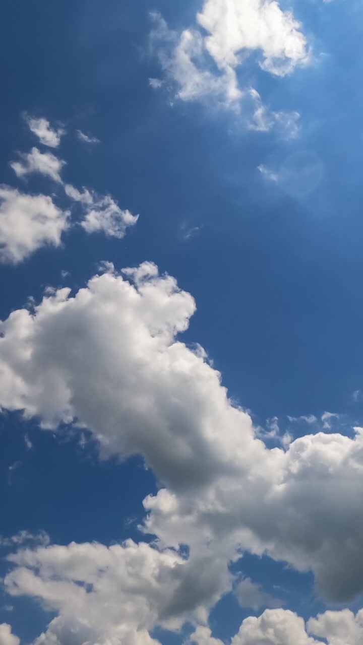 Quick transformation of beautiful clouds in the skies. Grey clouds accumulation timelapse. Vertical video