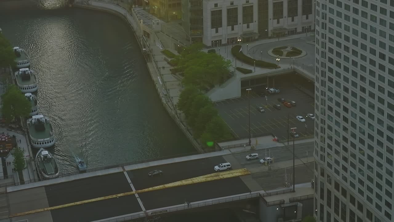 View of Chicago river and city buildings during evening hours