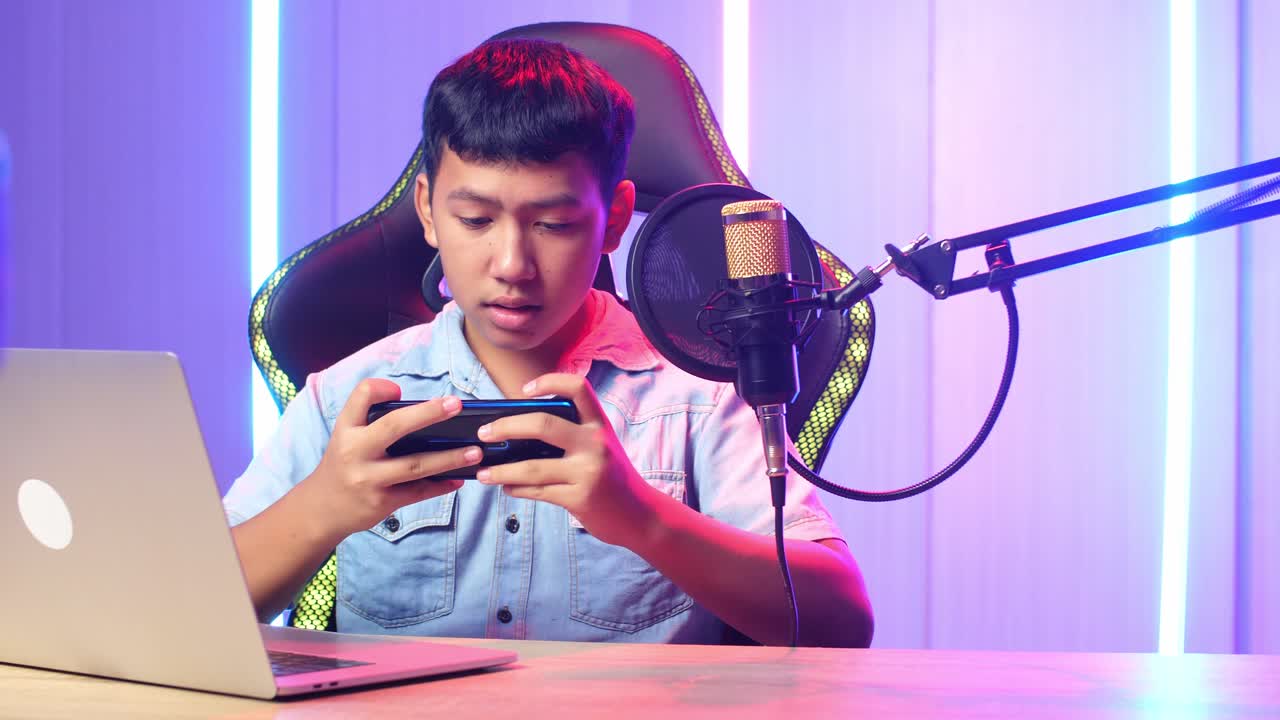 Asian Kid Boy Playing Video Game With Mobile Phone Then Lose The Game While Live Stream