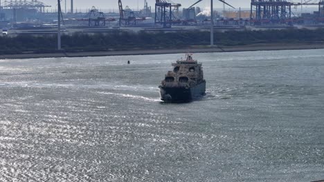 The-Gas-Tanker-LNG-London-Sailing-Near-the-Industrial-Port-in-Hoek-van-Holland,-Netherlands---Wide-Shot