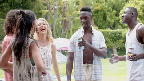 Diverse-group-of-friends-enjoying-a-conversation-outdoors