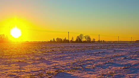 Barren-arid-farmland-winter-sunset-timelapse-passing