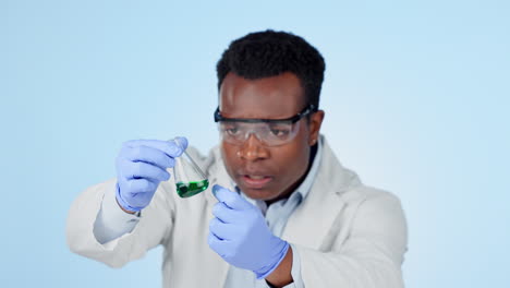 Scientist,-man-and-liquid-in-studio-for-chemistry