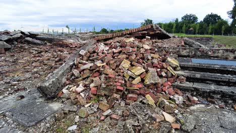 destroyed building and piles of fallen rubbles in