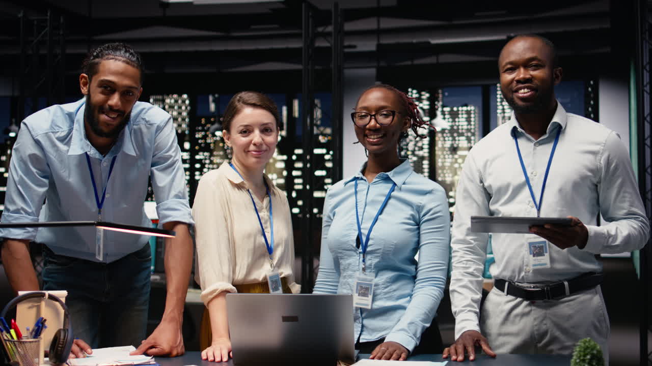 Diverse coworkers portrait, working late in office, collaborating on strategy
