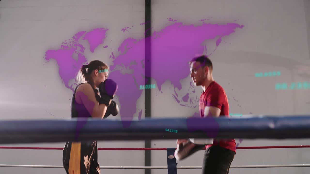 Trainer giving cues and positioning pads, boxer landing jabs, crosses and hooks during boxing drill