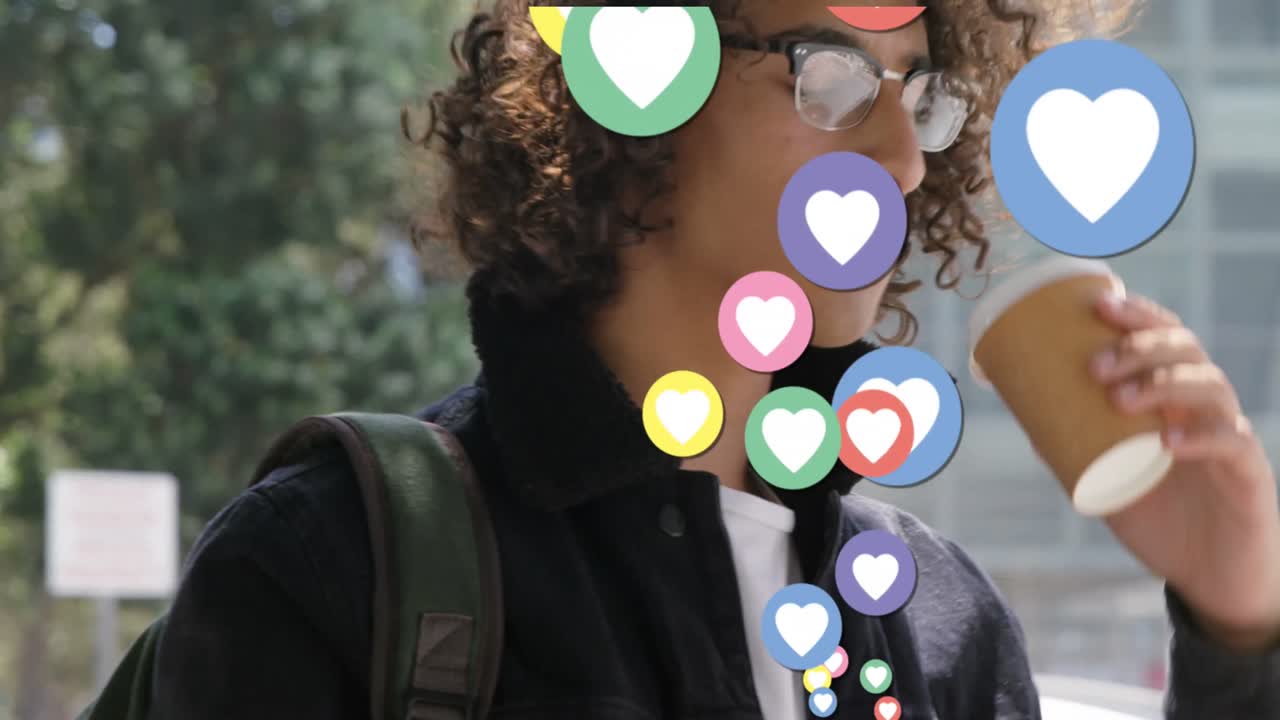 Animation of social media icons over man drinking takeaway coffee