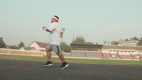 overweight man running for exercising