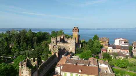 castello scaligero di lazise - lazise castle with a view of lake garda in verona, veneto, italy. - aerial shot
