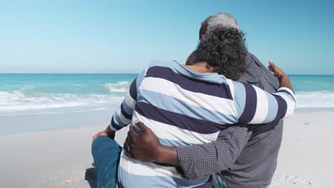 senior couple looking at the beach