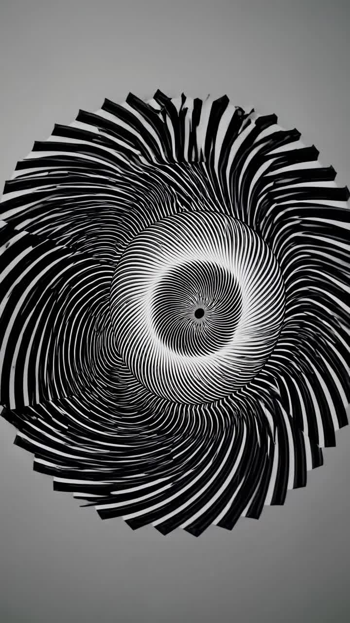 Abstract black and white spiral pattern from a top-down angle, creating a hypnotic effect, suitable