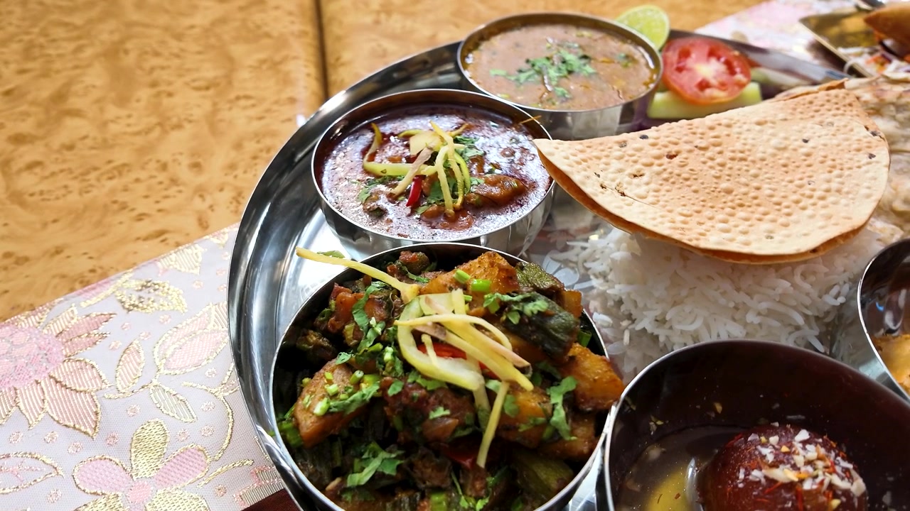 Traditional Indian Thali Platter Served on a Metal Tray