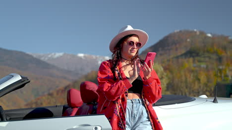 woman on a road trip in a convertible