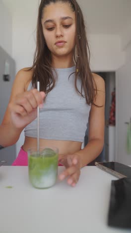 woman preparing a matcha latte