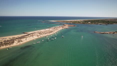 boats in tropical sand beach aerial view