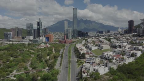 aerial dolly towards downtown monterrey showing the large skyscrapers, nuevo leon