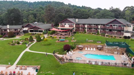 4k drone video of mountainside resort at little switzerland, nc on summer day-1