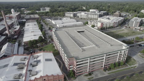 aerial drone of an empty parking deck and an empty parking lot