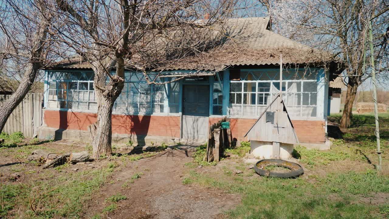 An old abandoned house in a Ukrainian village. Locked