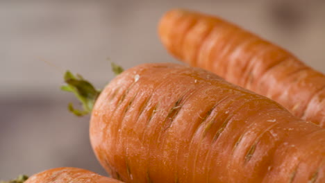 Close-up-on-a-bunch-of-fresh,-ripe,-locally-picked-carrots