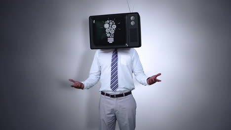 un hombre de negocios con una televisión en la cabeza.