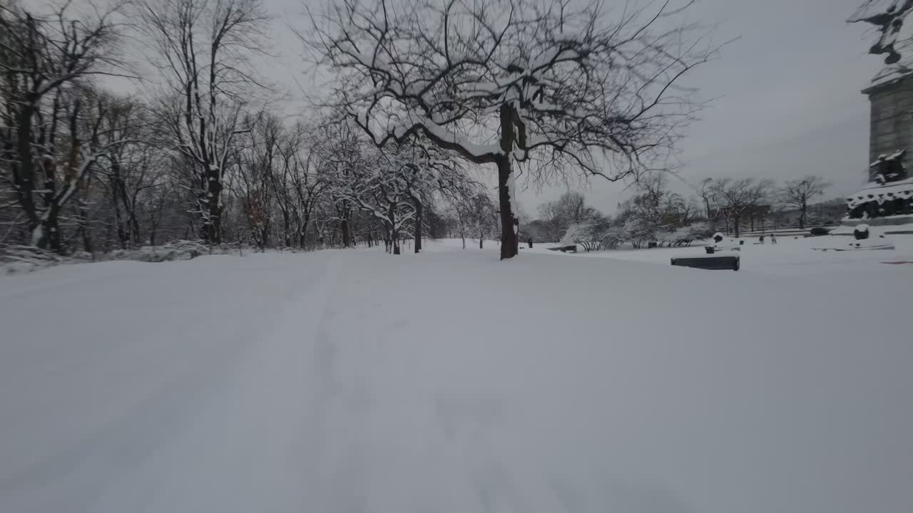 Mount Royal Park In Deep Snow With Monument Of Sir George Etienne Cartier In Montreal, Quebec, Canada. FPV Shot