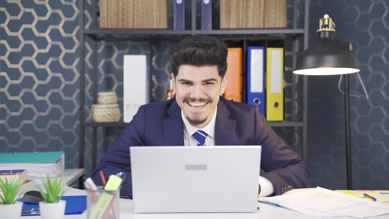 Happy businessman looking at camera with surprise and smiling ...