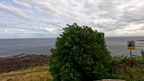 scenic view of sea and sky in scotland